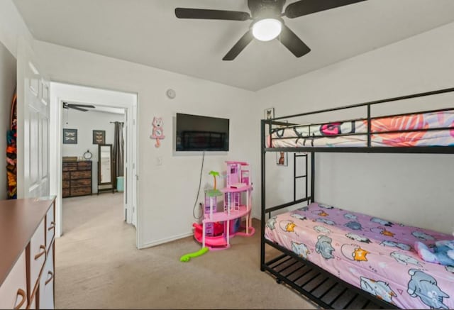 bedroom featuring carpet flooring and baseboards