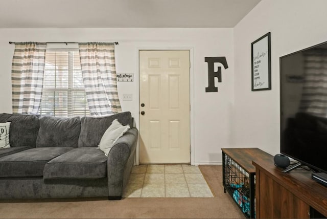 living room with tile patterned flooring