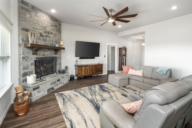 living room with ceiling fan, a fireplace, dark wood-type flooring, and recessed lighting