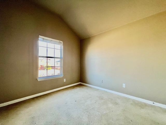 2436 Castle Pines Dr, Burleson, TX 76028 - carpeted spare room featuring lofted ceiling and baseboards