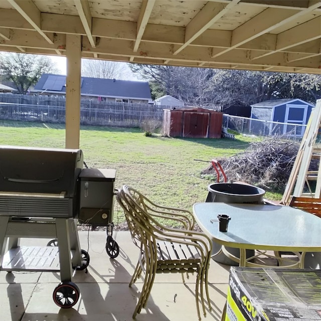 view of patio / terrace featuring fence