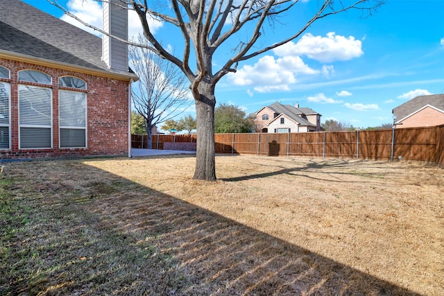 view of yard featuring a fenced backyard