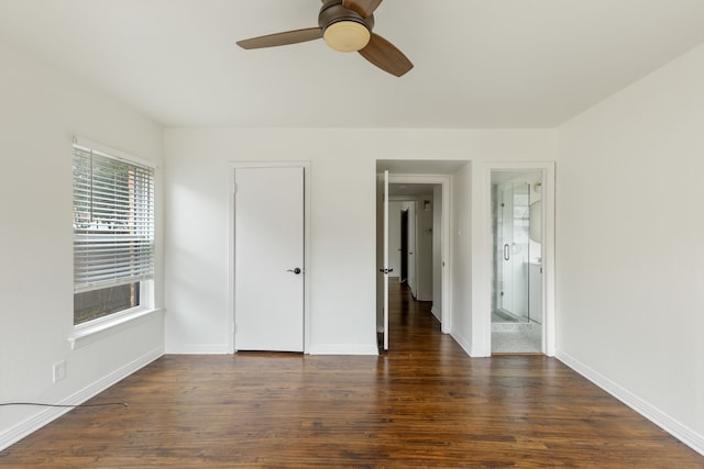 unfurnished bedroom featuring a ceiling fan, wood finished floors, baseboards, and connected bathroom