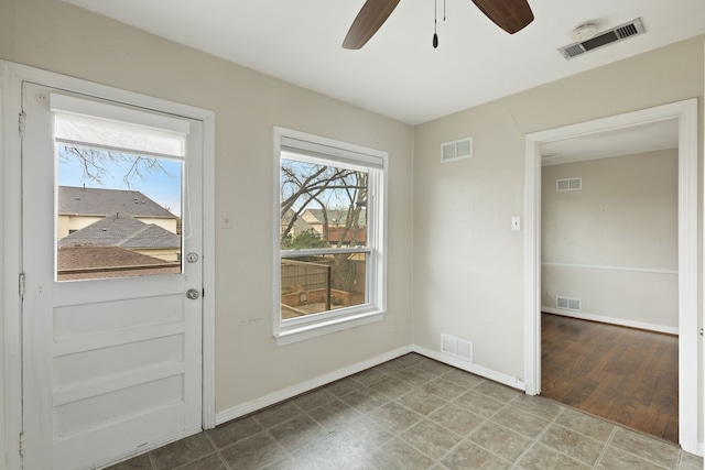 entryway featuring visible vents