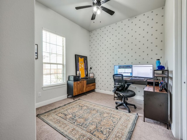 office with baseboards, ceiling fan, light carpet, and wallpapered walls