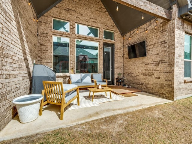 view of patio featuring grilling area and outdoor lounge area