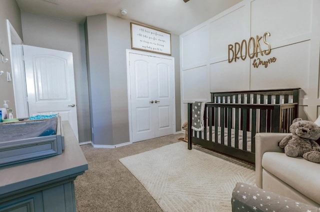 713 Falcon Rd, Argyle, TX 76226 - carpeted bedroom with a crib, a closet, and baseboards