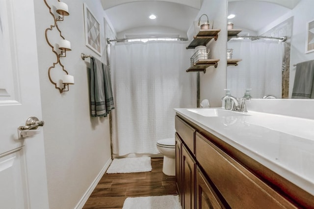 713 Falcon Rd, Argyle, TX 76226 - full bath with vanity, wood finished floors, curtained shower, and toilet