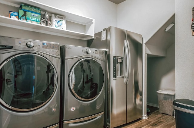 713 Falcon Rd, Argyle, TX 76226 - laundry room featuring wood finished floors and separate washer and dryer