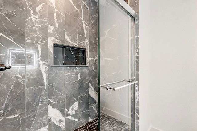 full bathroom with a shower stall