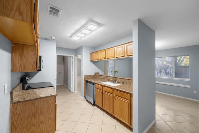 kitchen with electric stove, visible vents, stainless steel dishwasher, light tile patterned flooring, and a sink