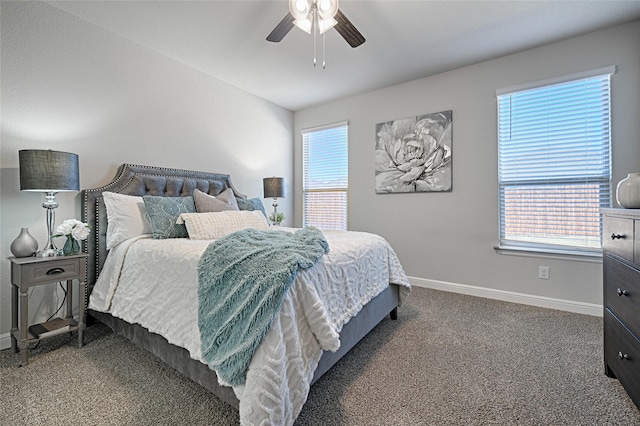 bedroom featuring multiple windows, carpet, baseboards, and ceiling fan