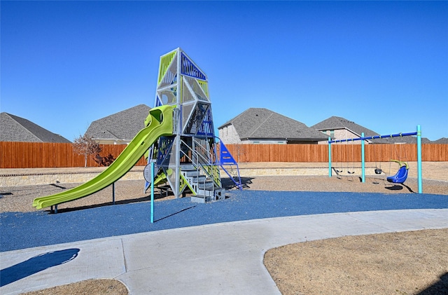 community jungle gym with fence