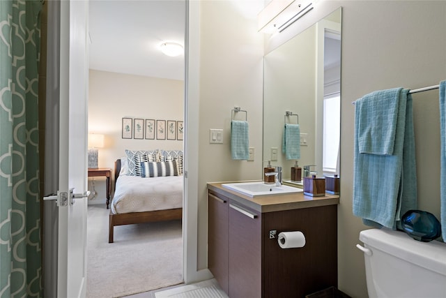 636 Benalla Dr, Frisco, TX 75036 - bathroom featuring toilet, vanity, and ensuite bathroom