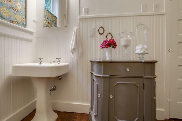 bathroom featuring wood finished floors