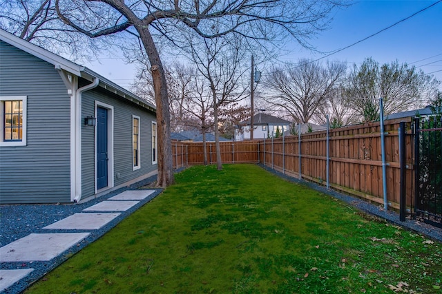 view of yard featuring a fenced backyard