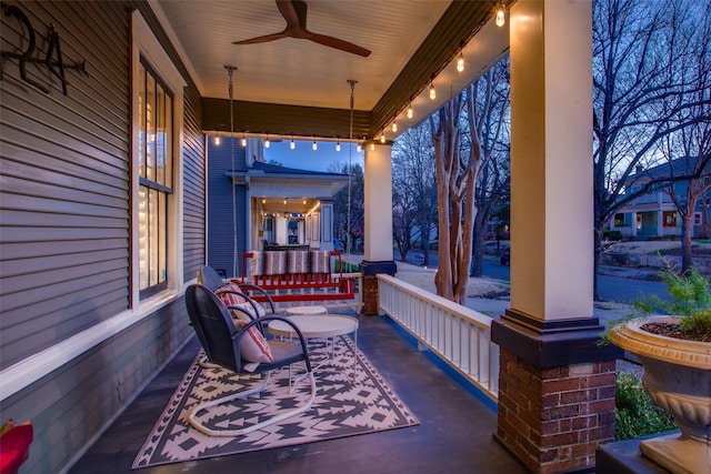 view of patio featuring covered porch and ceiling fan