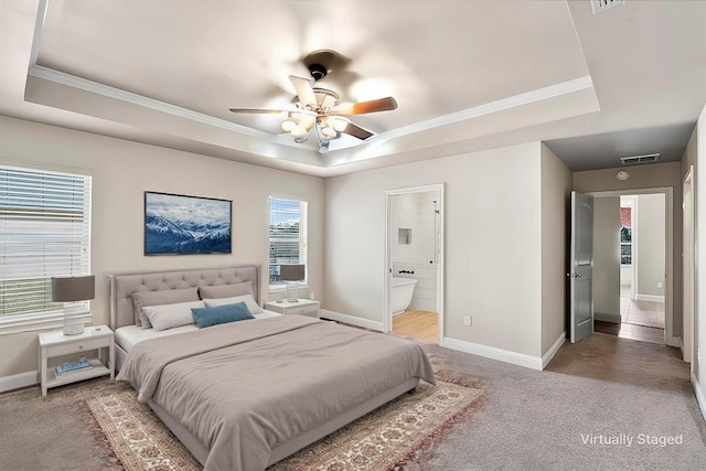2118 Darby Dan Ct, Granbury, TX 76049 - bedroom featuring a tray ceiling, crown molding, baseboards, light carpet, and ensuite bath