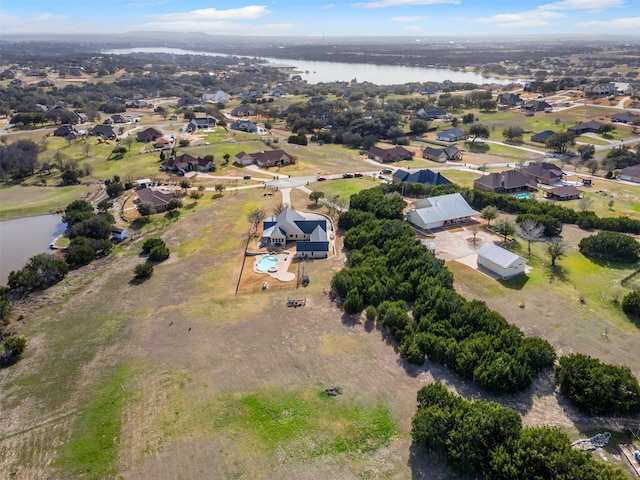 aerial view with a residential view and a water view