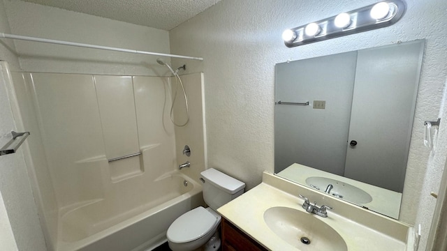 full bath with a textured ceiling, a textured wall, toilet, vanity, and shower / washtub combination