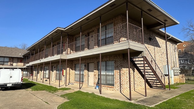 view of building exterior with stairway