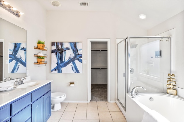 1503 Norway Pine St, Arlington, TX 76012 - full bath featuring a stall shower, tile patterned flooring, a bath, vanity, and a walk in closet