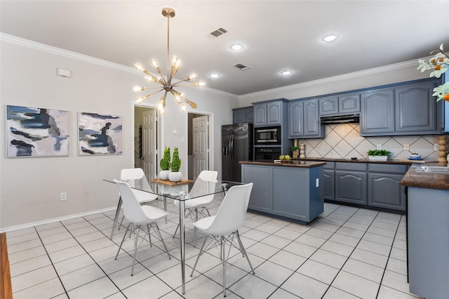 1503 Norway Pine St, Arlington, TX 76012 - kitchen featuring stainless steel microwave, fridge with ice dispenser, oven, crown molding, and a chandelier