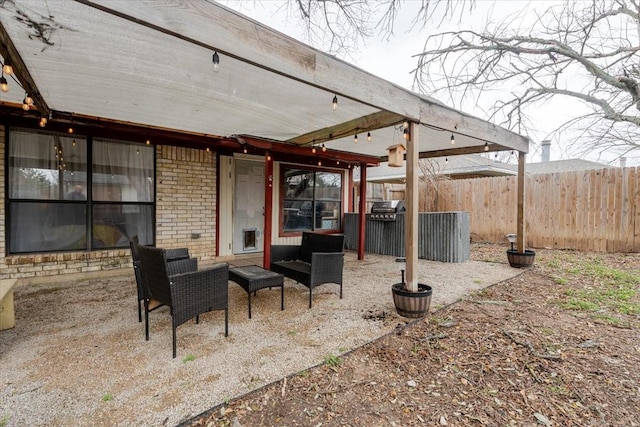 view of patio / terrace with fence