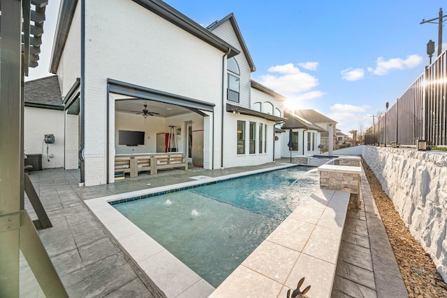 6728 Palermo Trl, Flower Mound, TX 75077 - rear view of house with a fenced backyard, an outdoor pool, an outdoor hangout area, brick siding, and a patio area