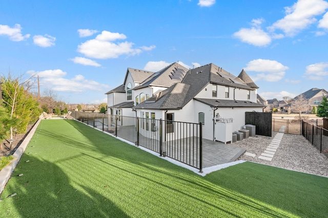 6728 Palermo Trl, Flower Mound, TX 75077 - rear view of house with a lawn, a patio, a residential view, and a fenced backyard