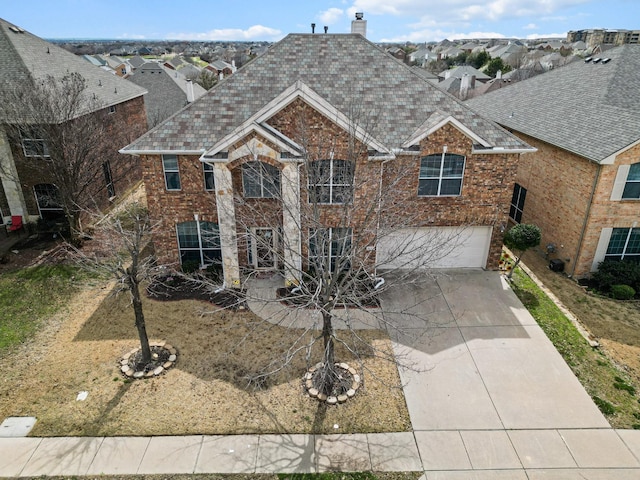 3532 Delaney Dr, Fort Worth, TX 76244 - traditional-style house featuring an attached garage, driveway, brick siding, a chimney, and a residential view