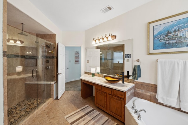 3532 Delaney Dr, Fort Worth, TX 76244 - full bathroom with a stall shower, tile patterned flooring, a garden tub, and vanity