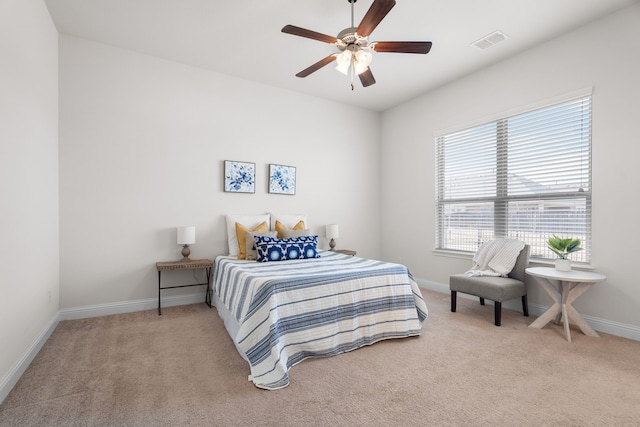 bedroom featuring carpet, visible vents, ceiling fan, and baseboards