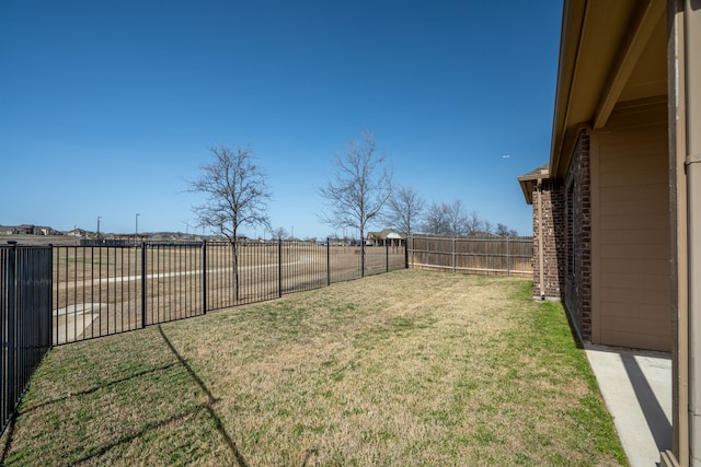 view of yard featuring a fenced backyard