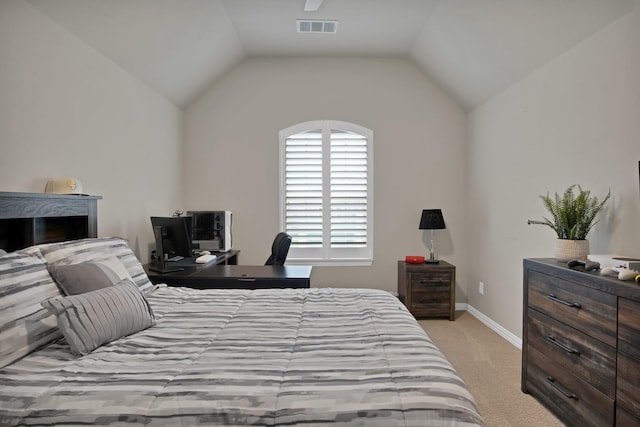 bedroom with light colored carpet, visible vents, lofted ceiling, and baseboards