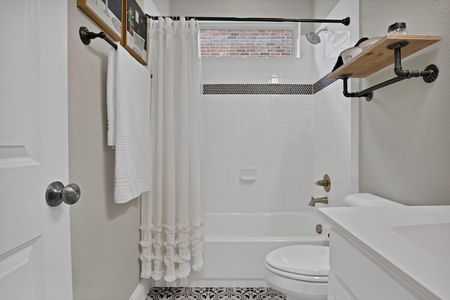 full bath with shower / tub combo, vanity, and toilet