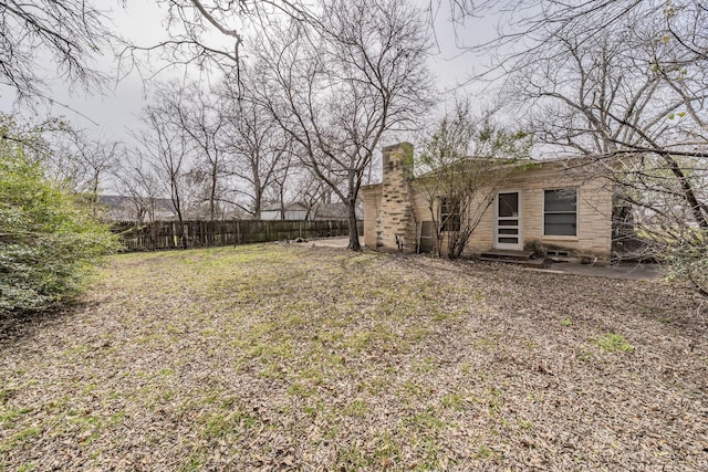 view of yard with fence