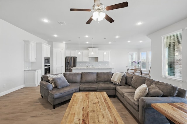 4303 Juniper Ln, Melissa, TX 75454 - living area featuring visible vents, a ceiling fan, recessed lighting, light wood finished floors, and baseboards