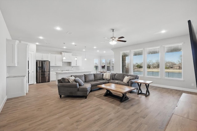 4303 Juniper Ln, Melissa, TX 75454 - living room featuring light wood-style flooring, recessed lighting, a ceiling fan, and baseboards