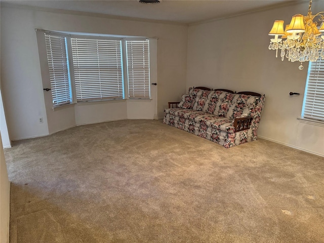 unfurnished living room with carpet flooring, crown molding, visible vents, and an inviting chandelier