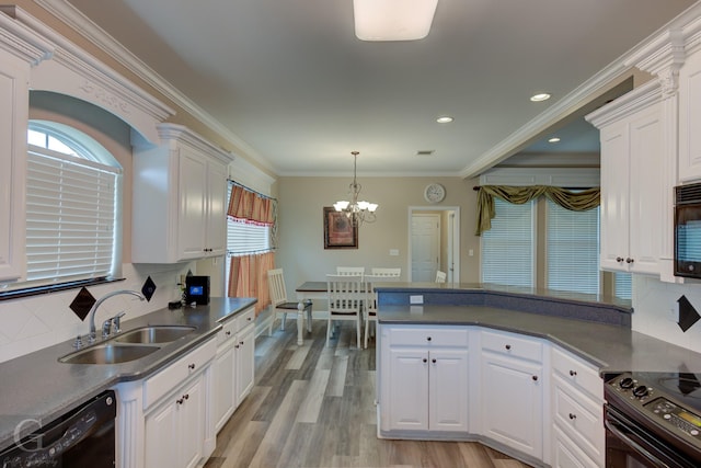 kitchen featuring light wood-style flooring, a sink, white cabinets, black appliances, and dark countertops