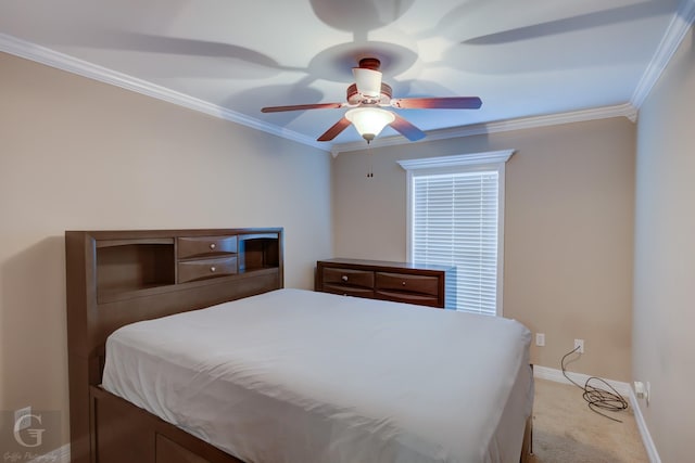 bedroom featuring crown molding, baseboards, a ceiling fan, and light colored carpet