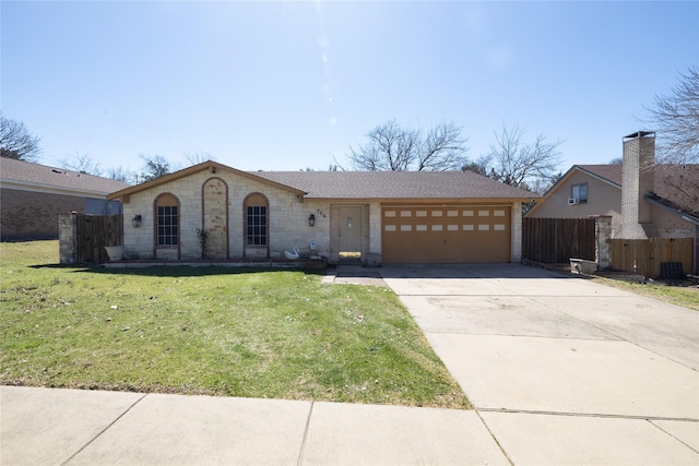 view of front of house with a garage, concrete driveway, a front lawn, and fence