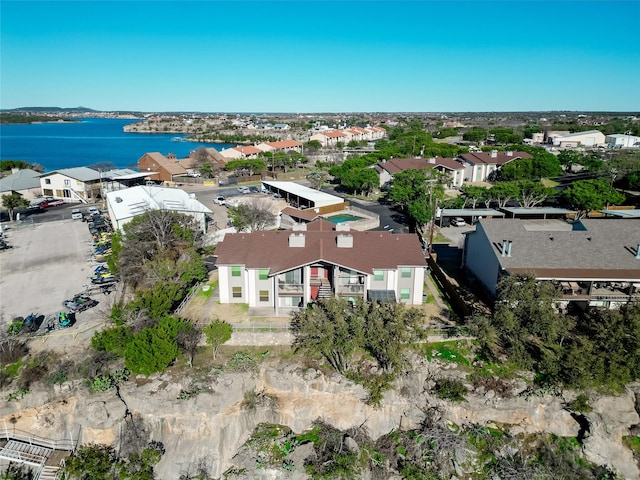 bird's eye view with a residential view and a water view