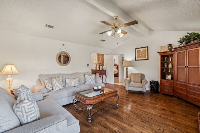 living area with lofted ceiling with beams, a textured ceiling, dark wood-style flooring, visible vents, and a ceiling fan