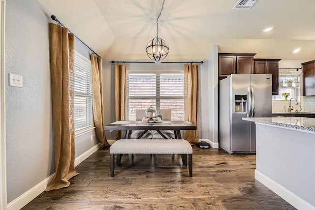 dining space featuring baseboards, visible vents, recessed lighting, dark wood-style flooring, and a notable chandelier