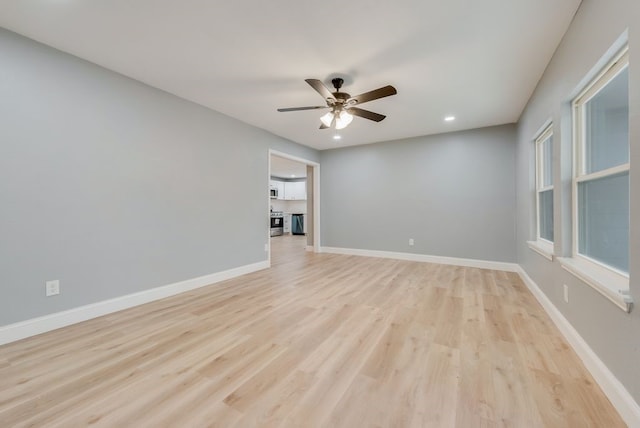 unfurnished room featuring light wood-type flooring, ceiling fan, baseboards, and recessed lighting