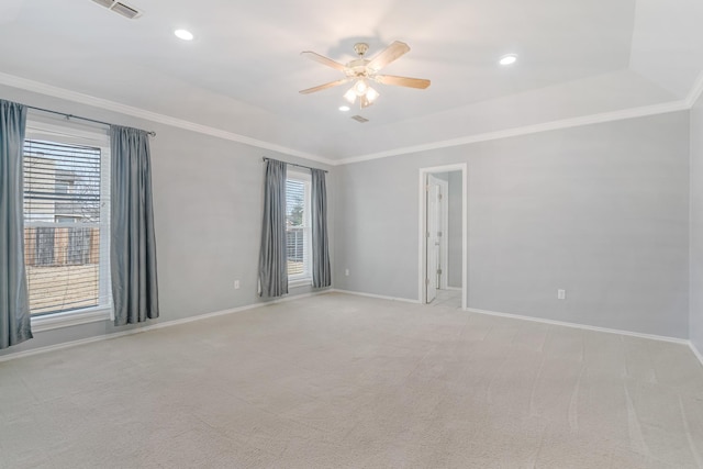 unfurnished room featuring light carpet, baseboards, ornamental molding, and ceiling fan