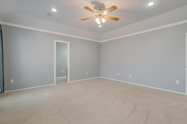 empty room with recessed lighting, light colored carpet, visible vents, ceiling fan, and baseboards