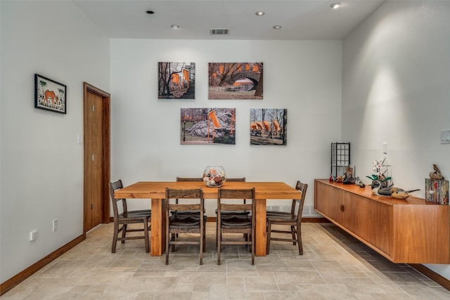 dining room with recessed lighting, visible vents, and baseboards